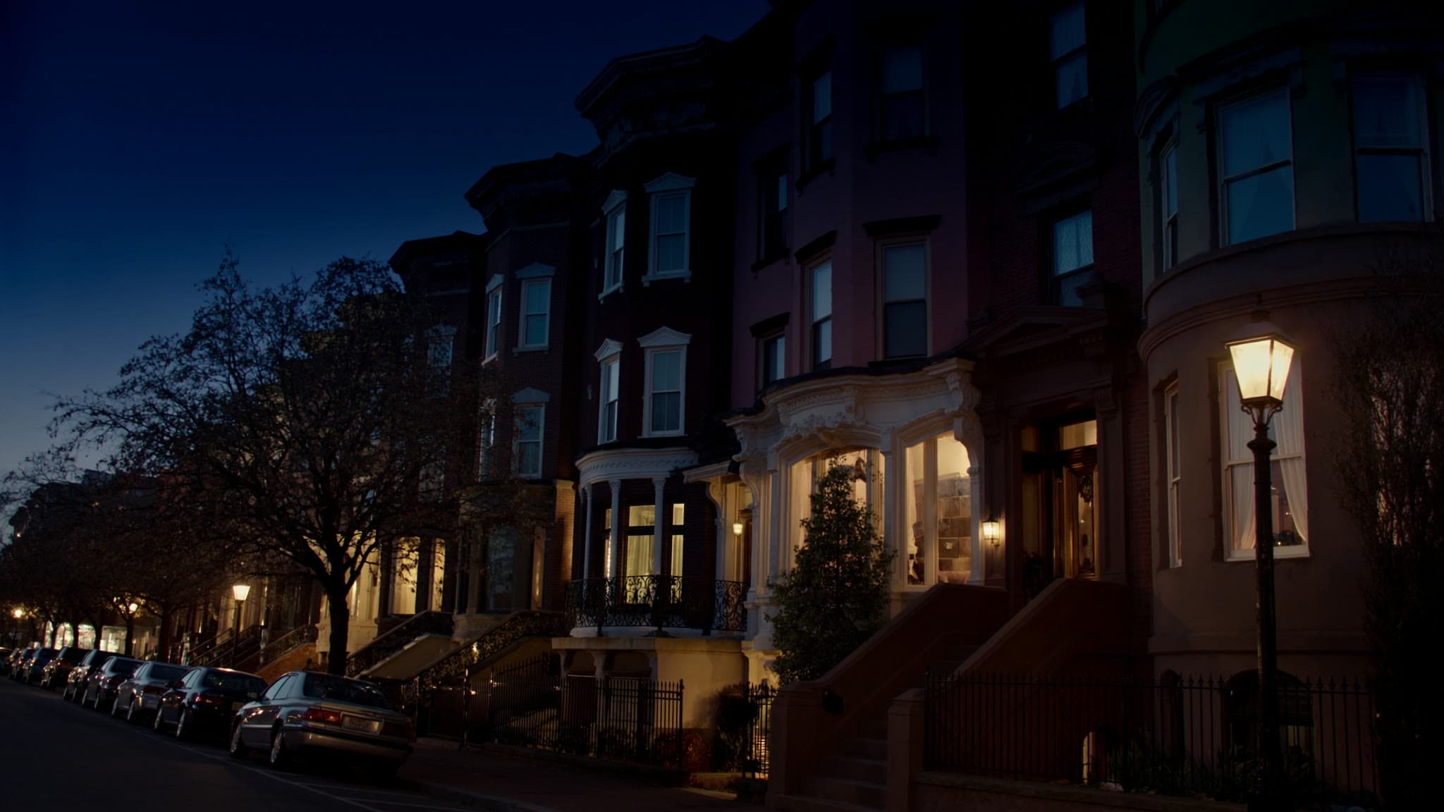 Back Bay at dusk: stylized artwork of brownstone bowfronts, not a photograph