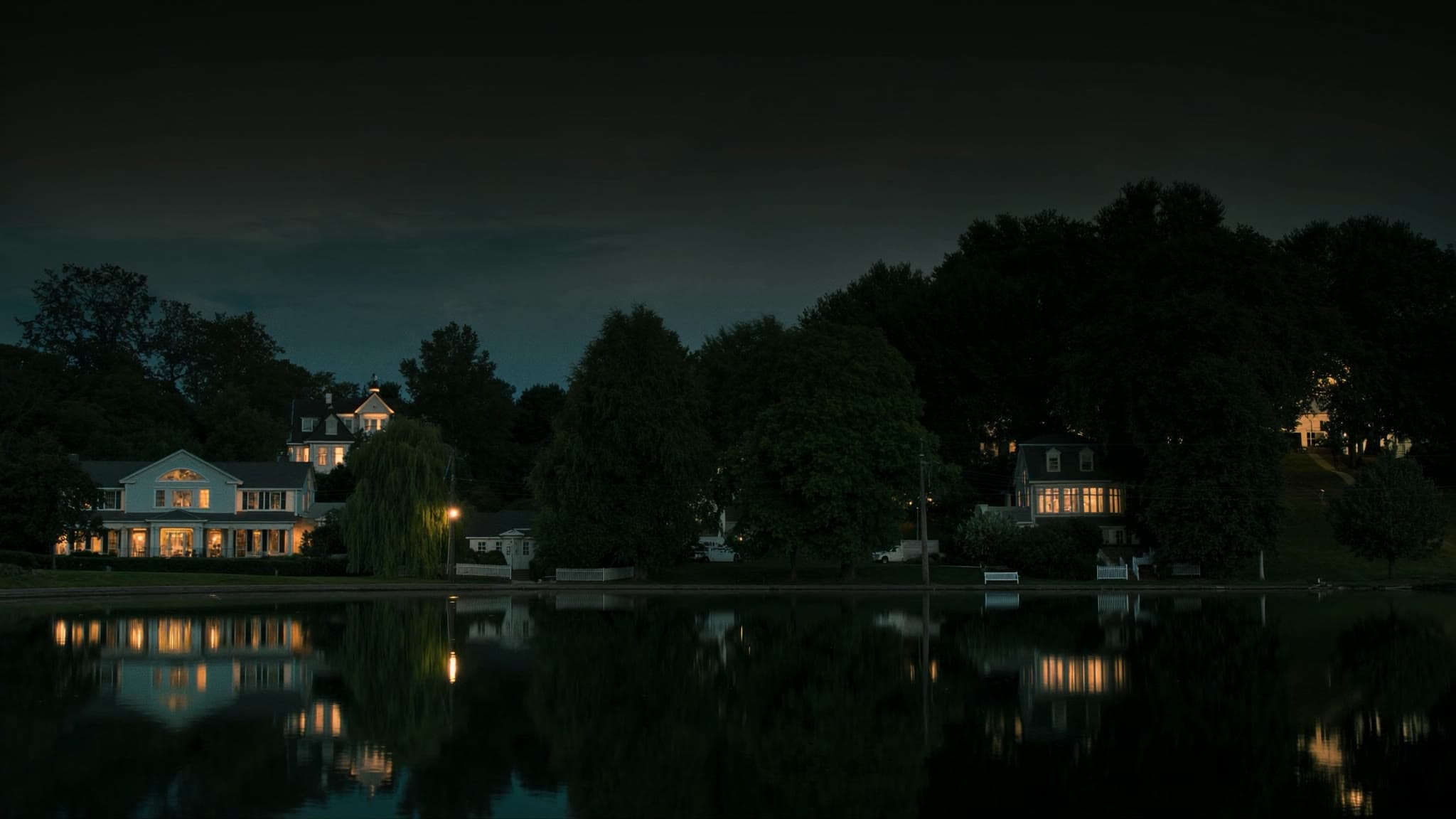 Jamaica Plain at dusk: stylized artwork of Jamaica Pond and triple-deckers, not a photograph
